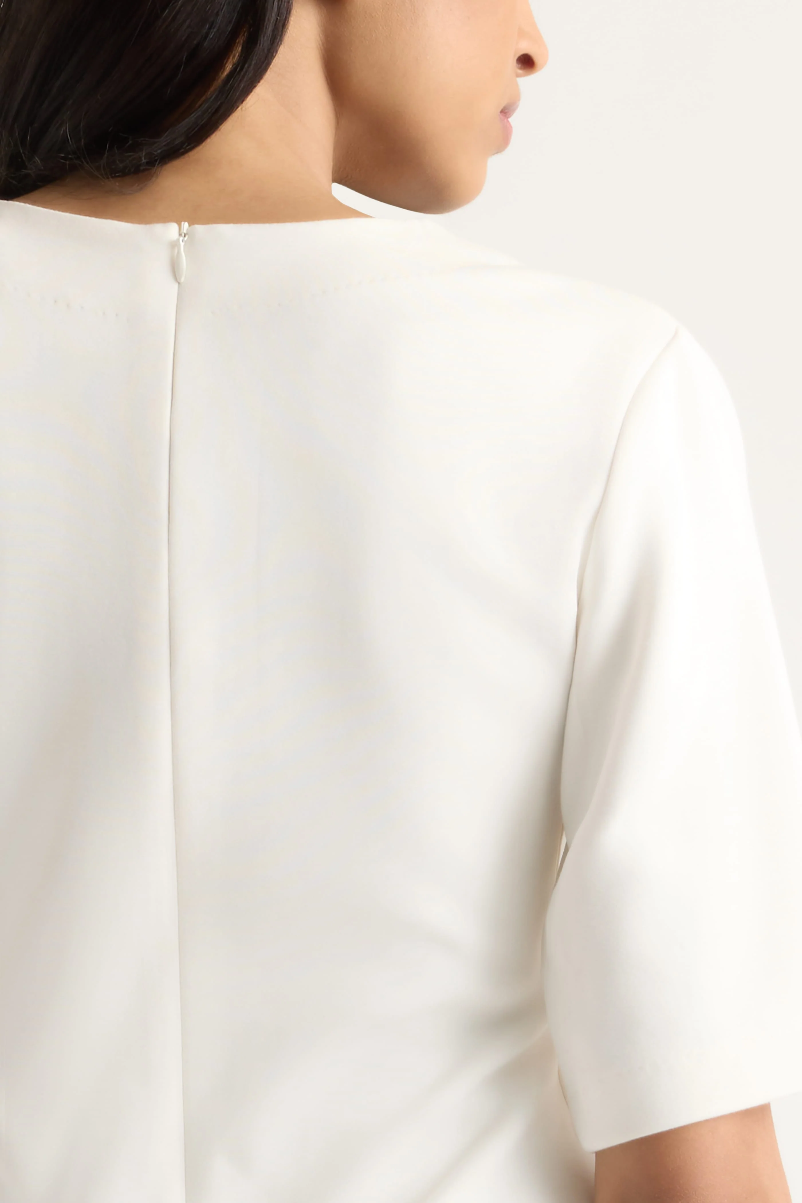 Reem Sculpted Curved-Hem Tee - Image 9
